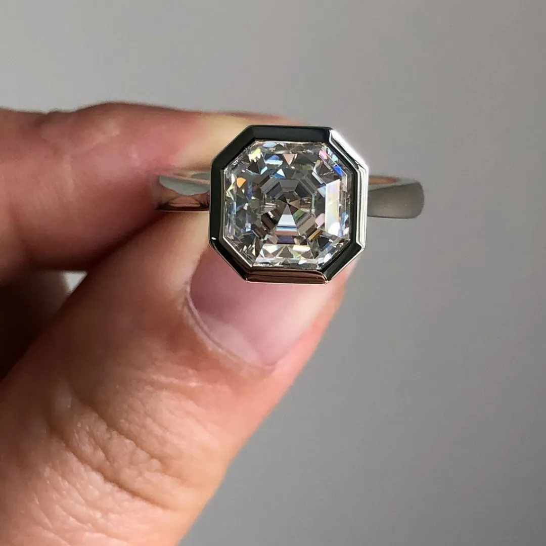 /public/photos/live/Asscher Cut Bezel Set Halo Engagement Ring 554 (1).webp